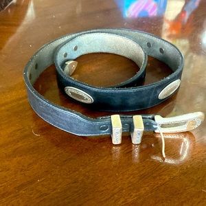 Brighton black leather belt with silver accents. 36 to 40 inches long.